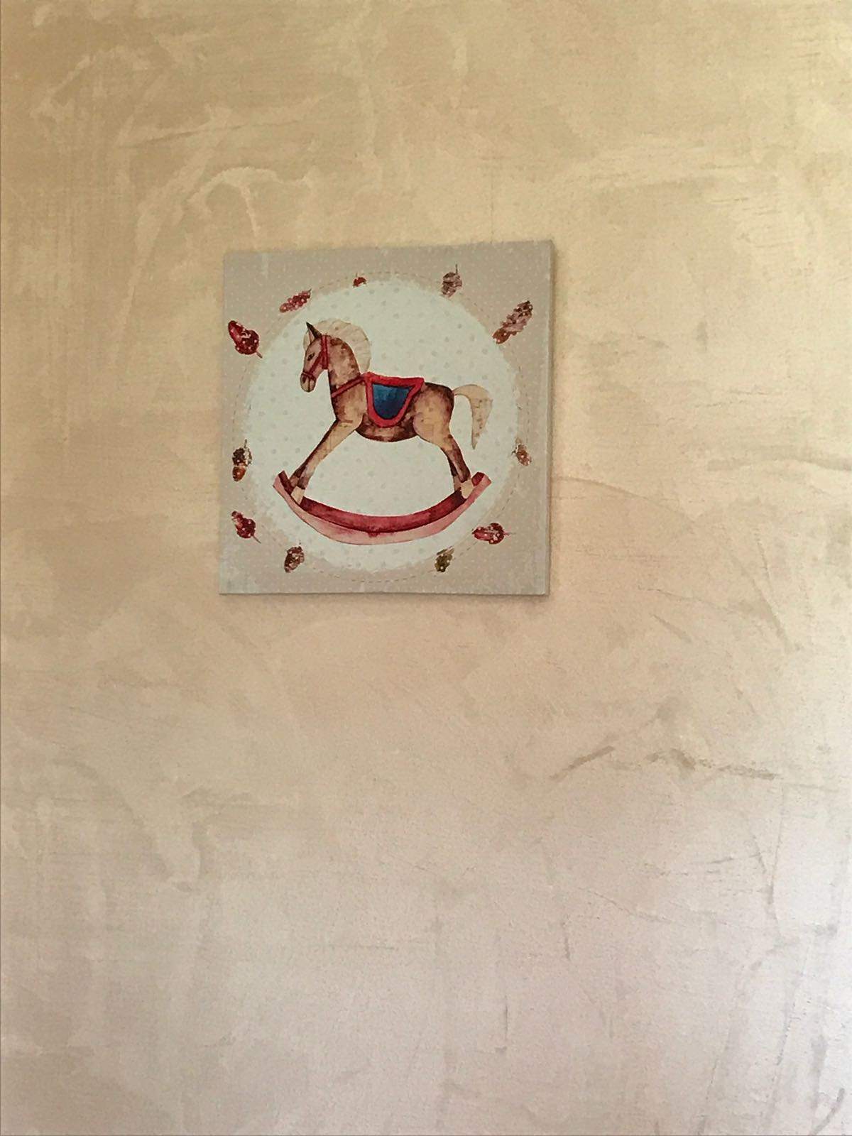 Quadretto con cavallo a dondolo